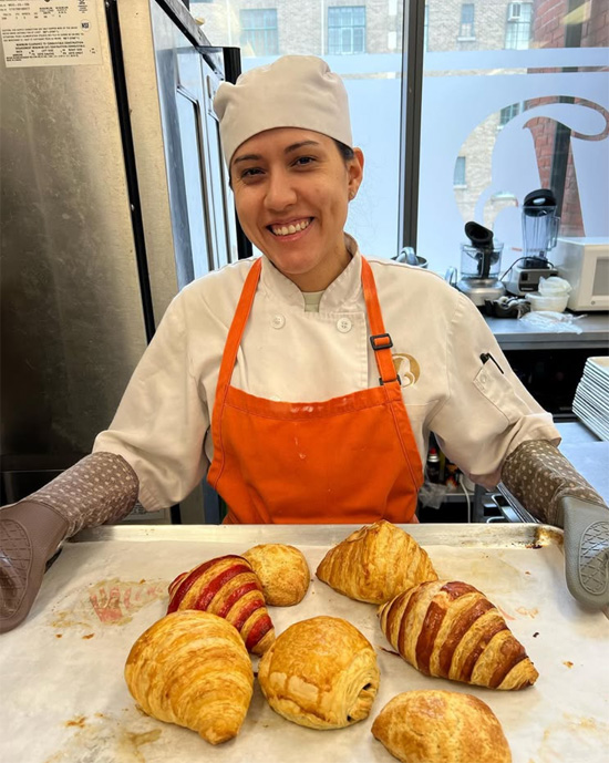 Baker with croissants